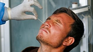 Scientists are researching tests that would be quicker than a standard PCR test and which would also ditch the uncomfortable-for-some nasal swab