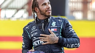 Hamilton condecorado pela Rainha Isabel II