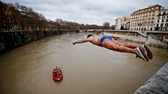 One of the divers takes the plunge on New Year's Day