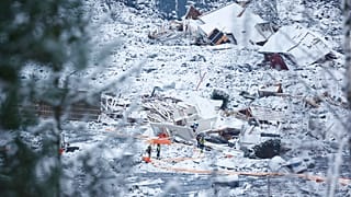 Rescue crews work in the area at Ask in Gjerdrum on Sunday