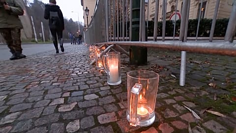 Candles inside beer glasses in protest against the closing of pubs and restaurants in the country. 