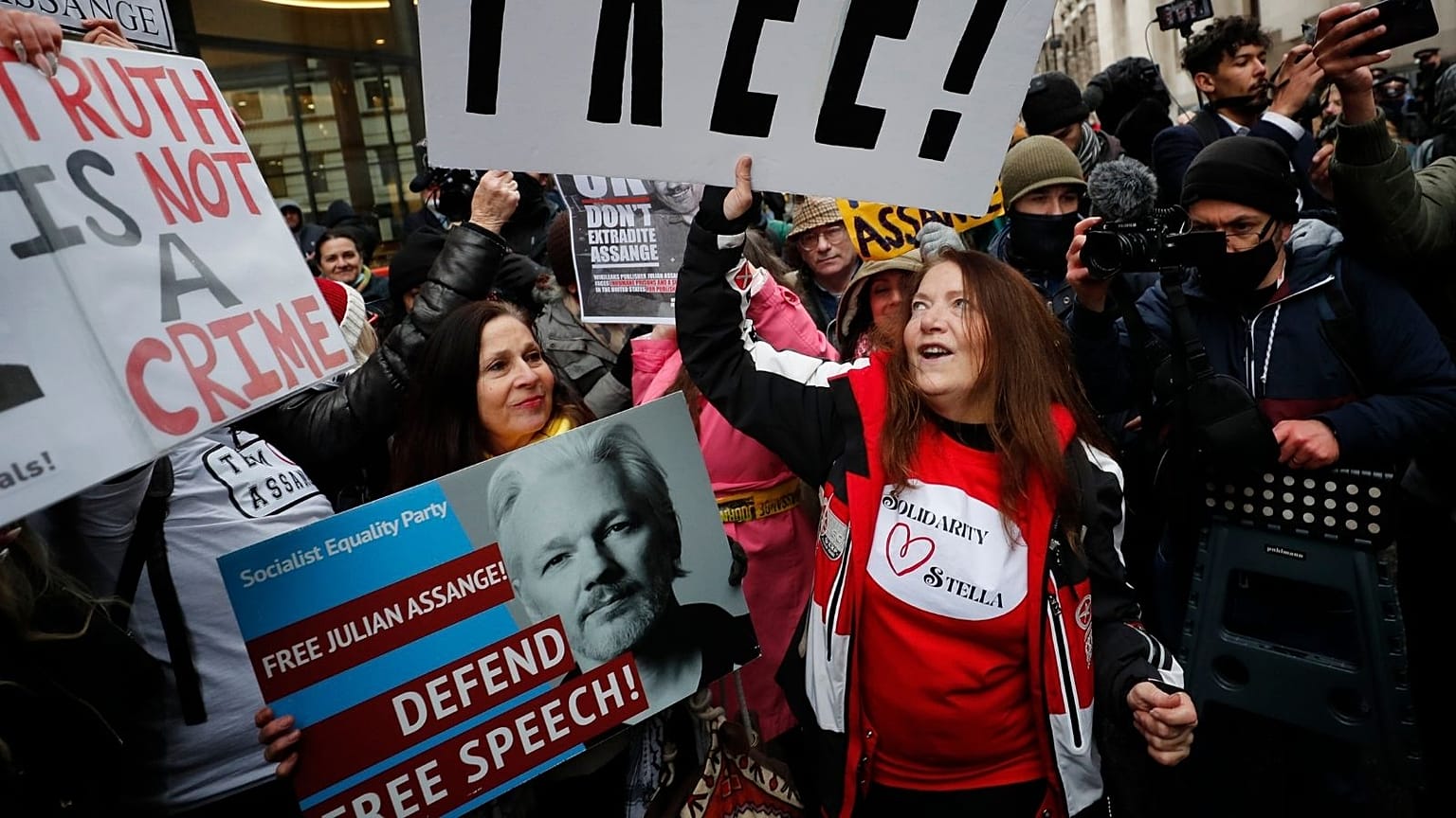Julian Assange supporters celebrate outside the Old Bailey in London