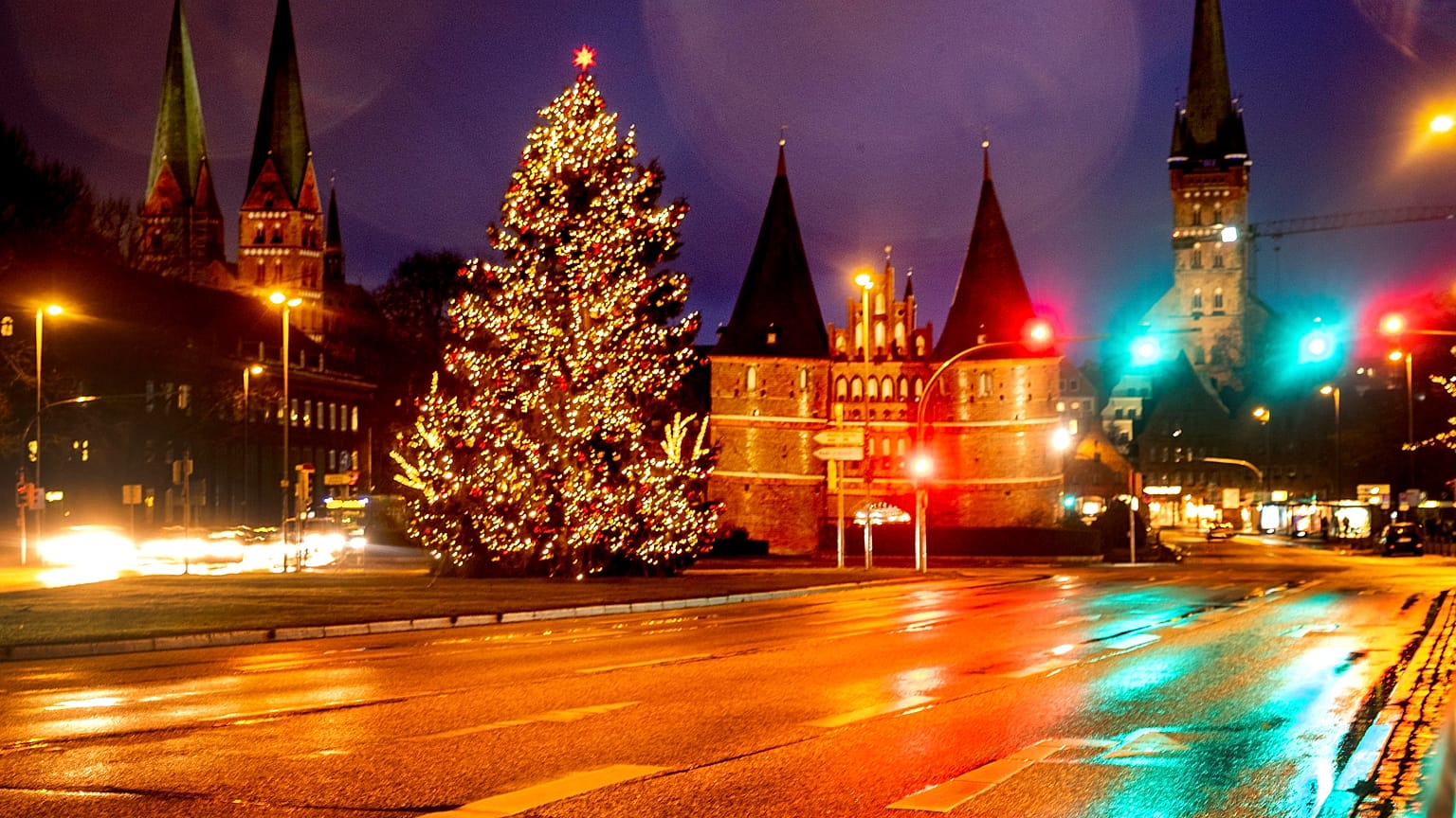 Streets are empty near the medieval Holstentor in Luebeck, Germany, Monday, Jan. 4, 2021.