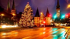 Streets are empty near the medieval Holstentor in Luebeck, Germany, Monday, Jan. 4, 2021.