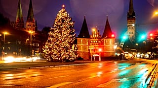 Streets are empty near the medieval Holstentor in Luebeck, Germany, Monday, Jan. 4, 2021.