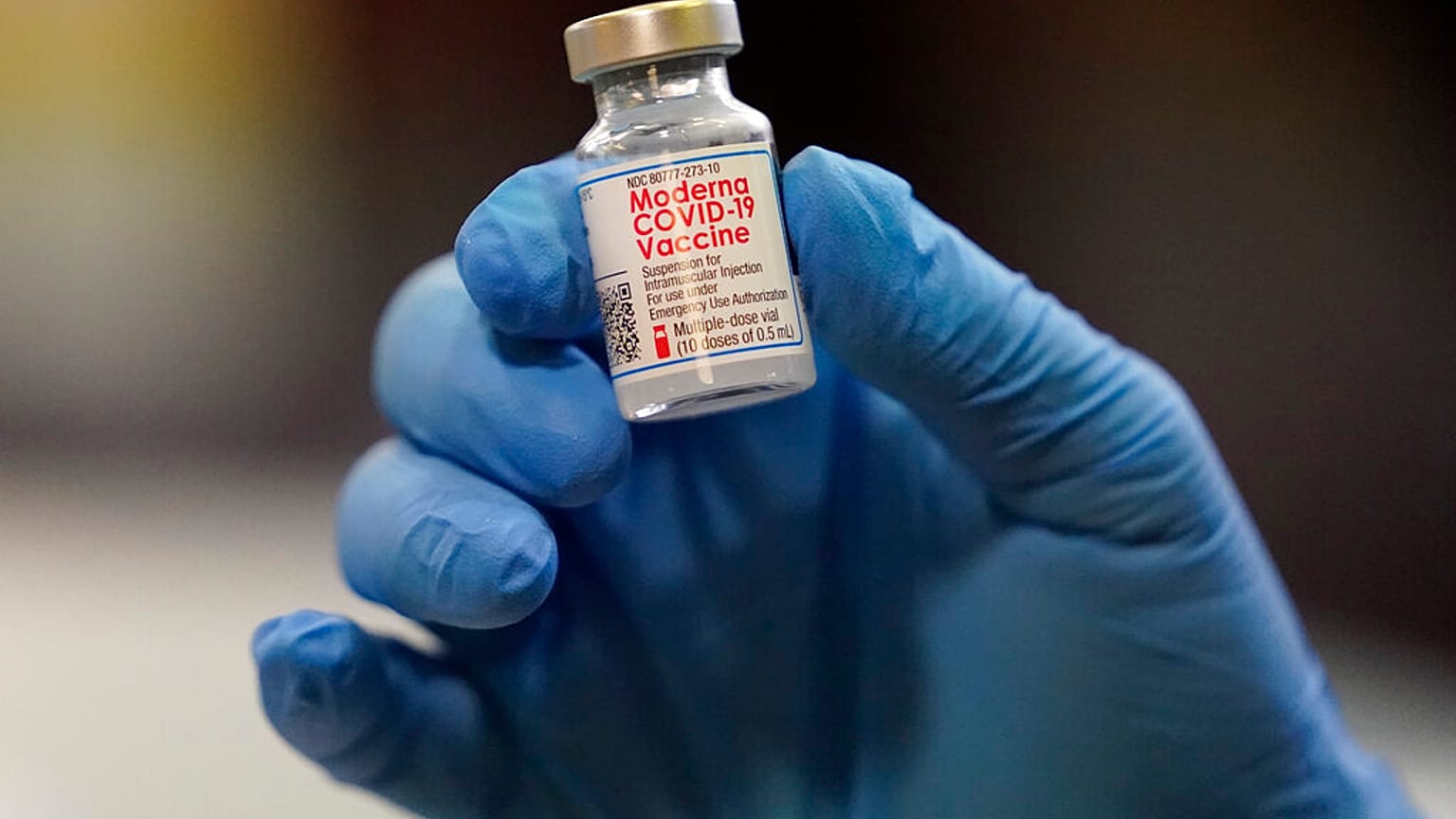 A vial of the Moderna COVID-19 vaccine is displayed at a pop-up vaccine clinic for EMS workers Center Tuesday, Jan. 5, 2021, in Salt Lake City