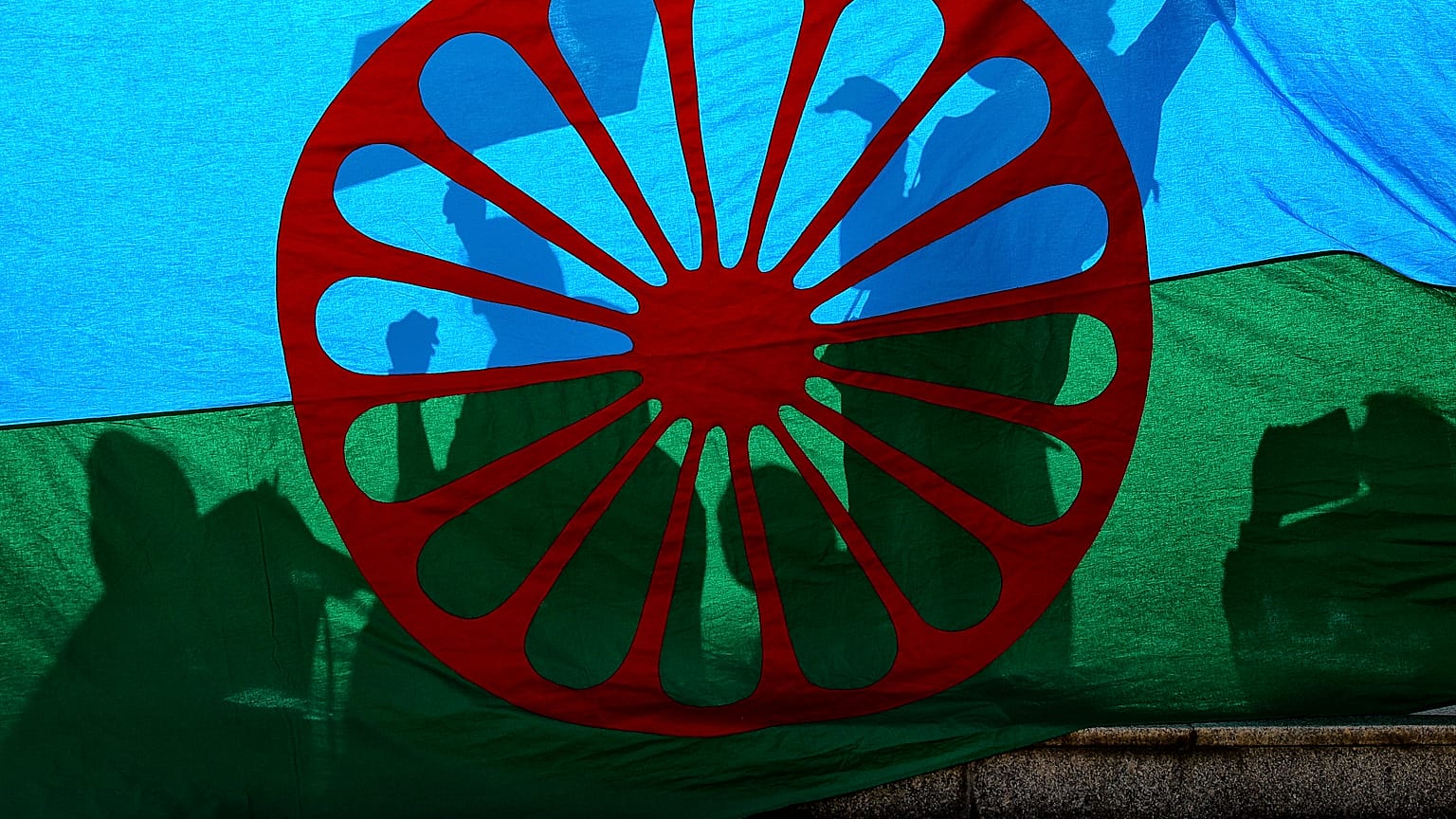 A Roma flag on display during an anti-racism march by members of the Romanian Roma community in Bucharest in 2019.