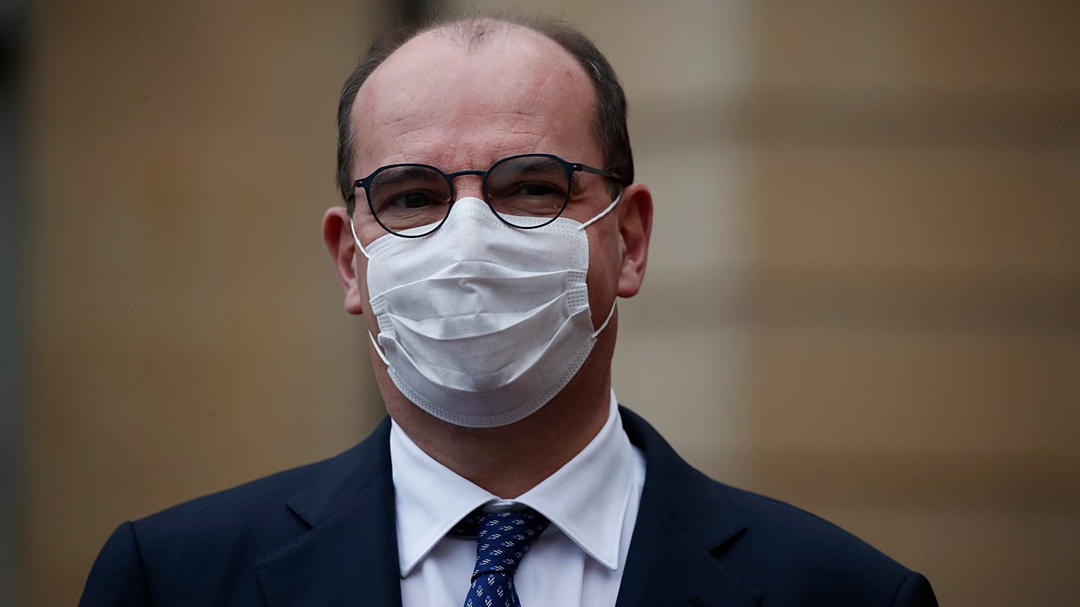 French Prime Minister Jean Castex waits for Tunisian Prime Minister Hichem Mechichi, prior to their meeting at Matignon, in Paris, Monday, Dec. 14, 2020. 