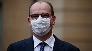 French Prime Minister Jean Castex waits for Tunisian Prime Minister Hichem Mechichi, prior to their meeting at Matignon, in Paris, Monday, Dec. 14, 2020.