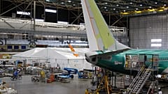 In this photo taken June 3, 2011, A white-tented construction area at left at the Boeing Co. 737 assembly facility in Renton, Wash.