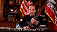 image from a video released by Schwarzenegger shows former Republican California Gov. Arnold Schwarzenegger delivering a public message.