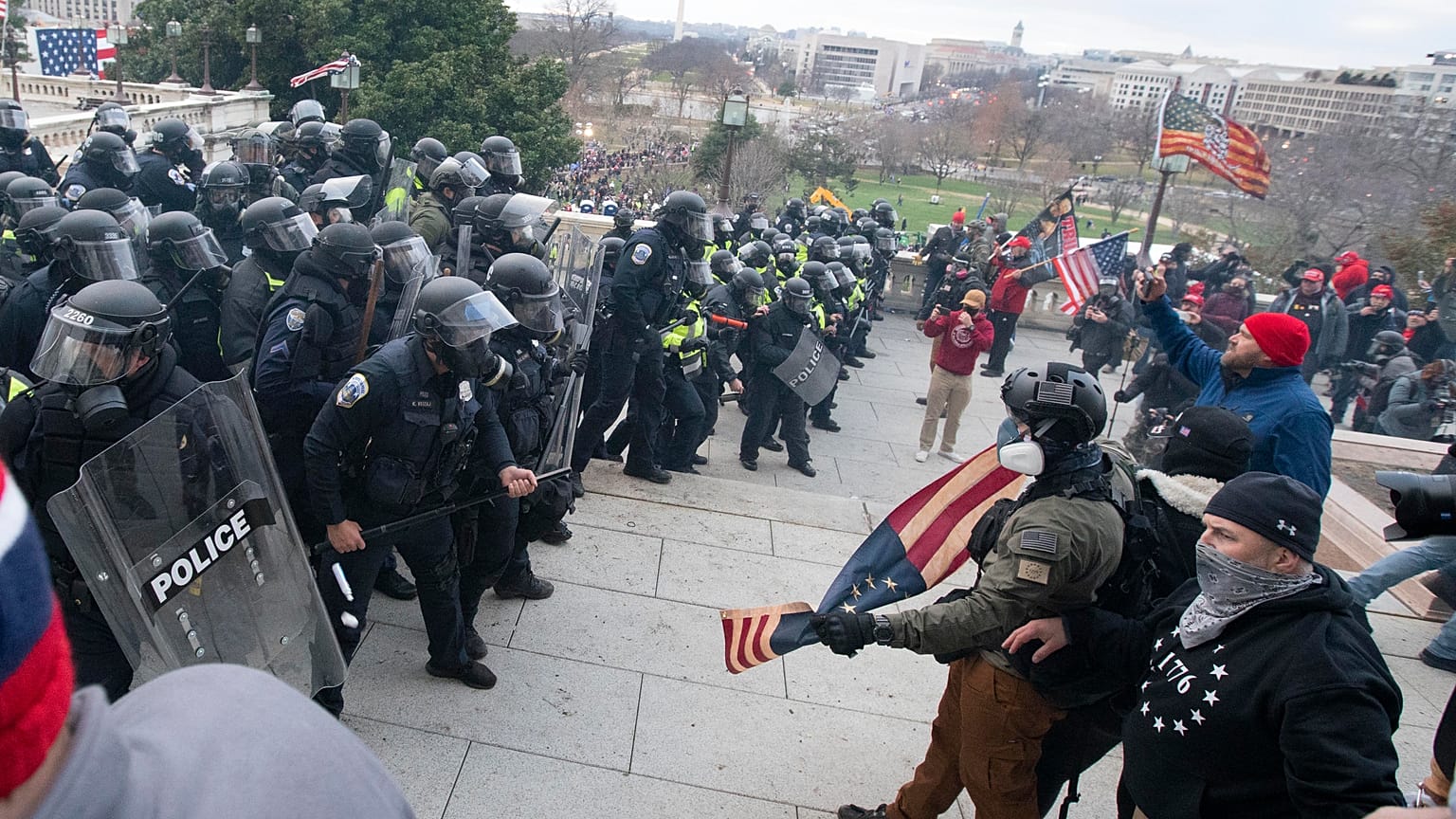 U.S. Capitol Police push back demonstrators who were trying to enter the U.S. Capitol on Wednesday, Jan. 6, 2021, in Washington.