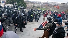 U.S. Capitol Police push back demonstrators who were trying to enter the U.S. Capitol on Wednesday, Jan. 6, 2021, in Washington.