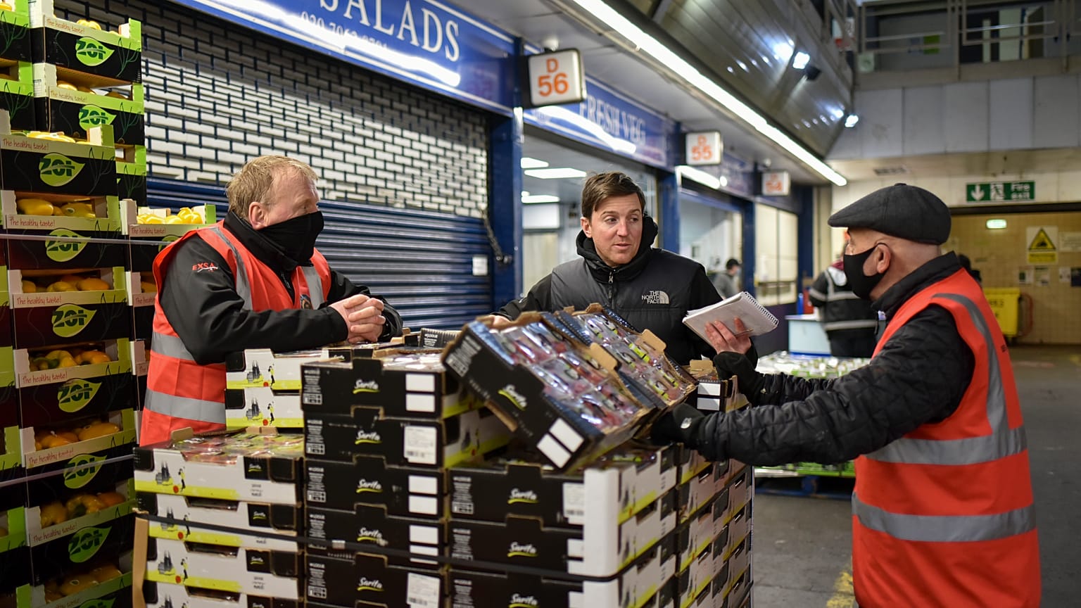 Gary Marshall of Bevington Salads and the Chairman of the Tenants Association, works at his stall in New Covent Garden Market, in London, Monday, Jan. 4, 2021. 