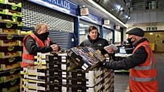 Gary Marshall of Bevington Salads and the Chairman of the Tenants Association, works at his stall in New Covent Garden Market, in London, Monday, Jan. 4, 2021. 