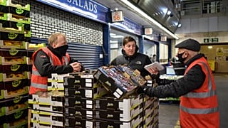 Gary Marshall of Bevington Salads and the Chairman of the Tenants Association, works at his stall in New Covent Garden Market, in London, Monday, Jan. 4, 2021. 