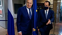 Russian Foreign Minister Sergey Lavrov, left, is greeted by his Cypriot counterpart Nikos Christodoulides