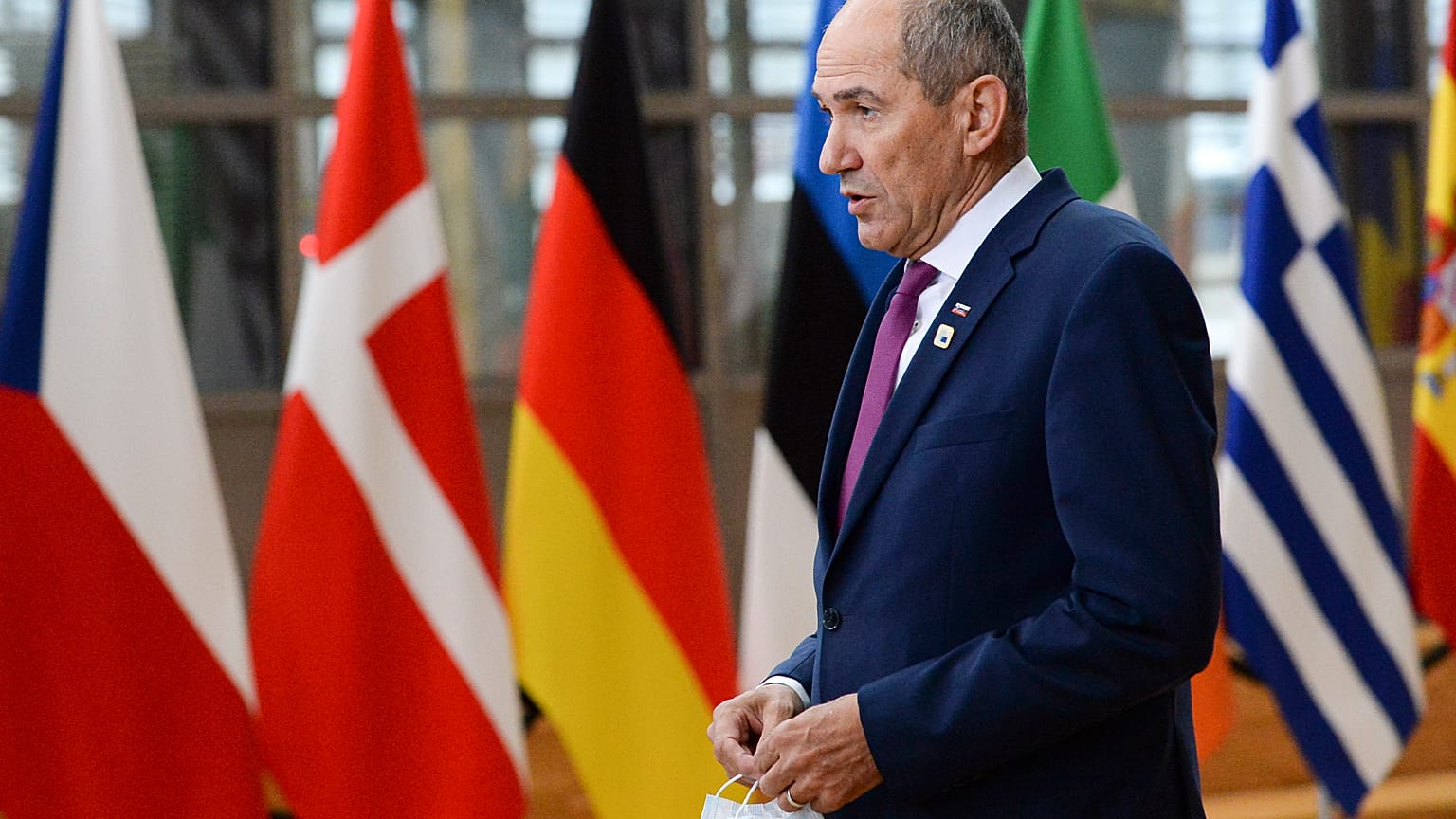 Slovenia's Prime Minister Janez Jansa speaks with the media as he arrived for an EU summit in Brussels in October.