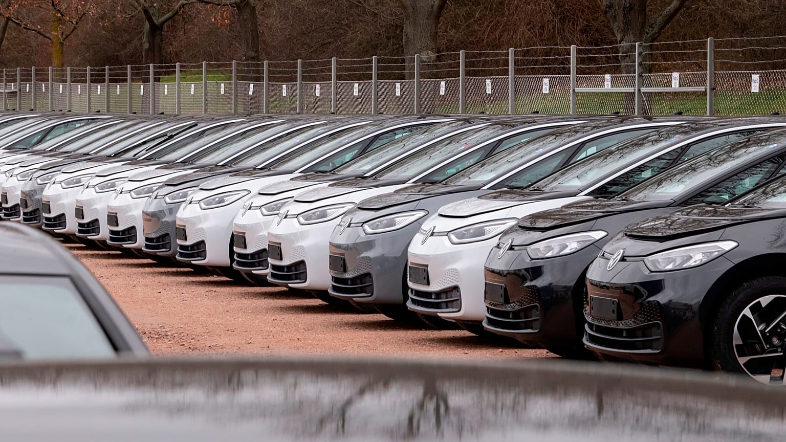 FILE - In this Tuesday, Feb. 25, 2020 file photo, Electric car ID.3 cars stand at the factory area during a press tour at the plant of the German manufacturer Volkswagen AG.