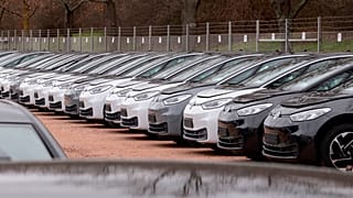 FILE - In this Tuesday, Feb. 25, 2020 file photo, Electric car ID.3 cars stand at the factory area during a press tour at the plant of the German manufacturer Volkswagen AG.