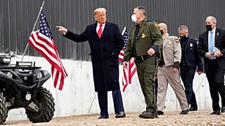 President Donald Trump tours a section of the U.S.-Mexico border wall under construction Tuesday, Jan. 12, 2021, in Alamo, Texas.
