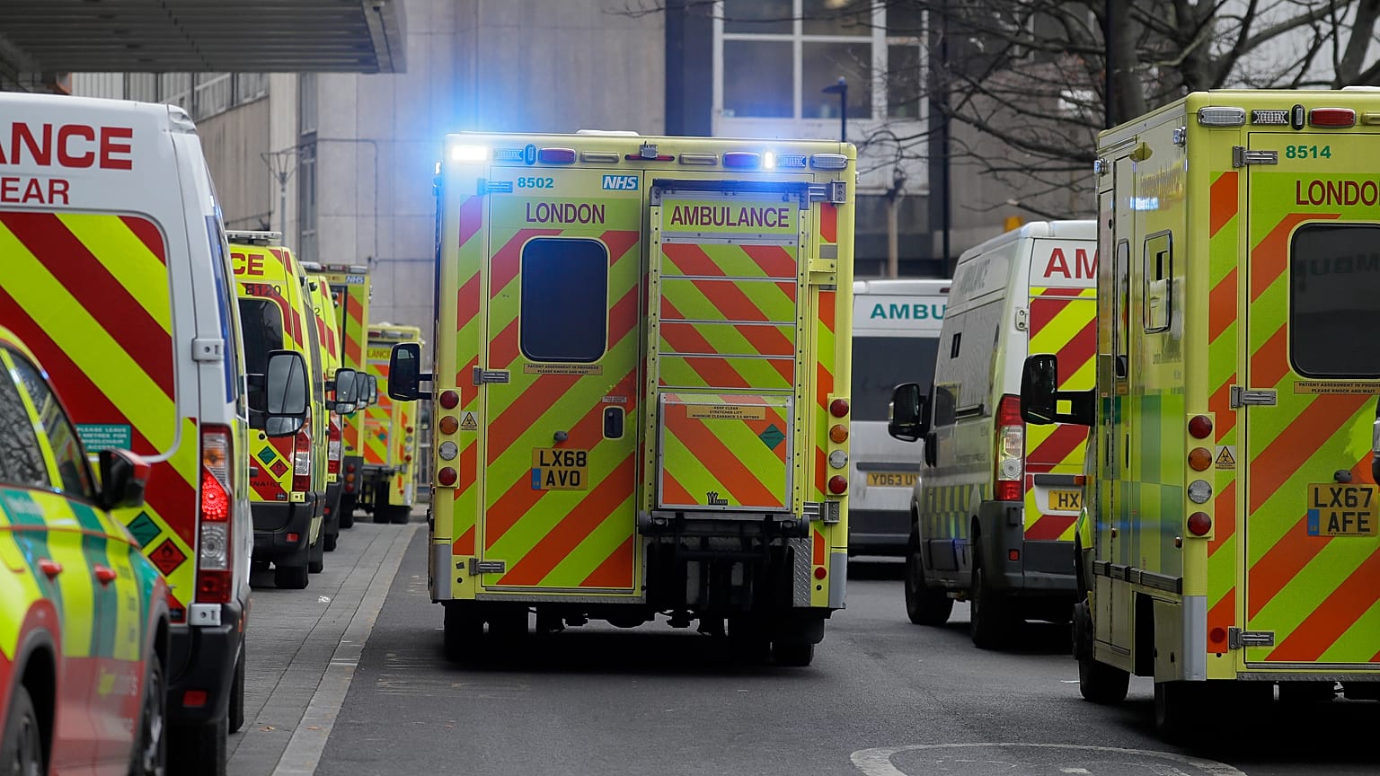 Ambulances queue outside the Royal London Hospital in London