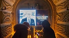 People place candles as they mourn the mayor of Gdansk, Pawel Adamowicz.