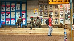Security forces patrol the streets near opposition leader Bobi Wine headquarters in Kampala, Uganda Wednesday, Jan. 13, 2021.