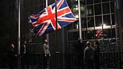 The Union flag is lowered and removed from outside of the European Parliament in Brussels, Friday, Jan. 31, 2020