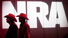 In this May 4, 2013, file photo, National Rifle Association members listen to speakers during the NRA's Annual Meetings and Exhibits in Houston, Texas.