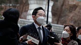 Samsung Electronics Vice Chairman Lee Jae-yong is questioned by reporters upon his arrival at the Seoul High Court in Seoul, South Korea, Monday, Jan. 18, 2021.