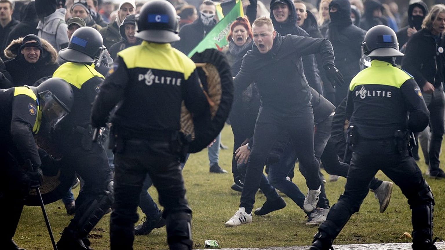 Police deployed water cannons against protestors in Amsterdam.