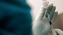 A member of staff at the university hospital prepares the Moderna vaccine against COVID-19 in Duesseldorf, Monday, Jan. 18, 2021.