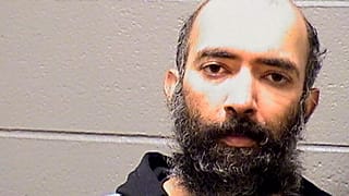 This Saturday, Jan. 16, 2021, booking photo provided by the Cook County Sheriff's Office shows Aditya Singh.