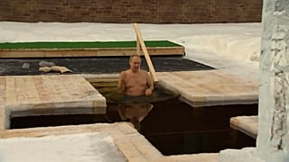 Vladimir Putin plunged into ice-cold water.