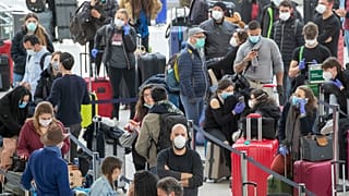 Travellers at JFK Airport, New York