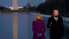 President-elect Joe Biden and his wife Jill Biden participate in a COVID-19 memorial event at the Lincoln Memorial Reflecting Pool, Tuesday, Jan. 19, 2021, in Washington