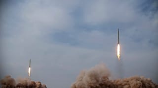 Iranian Revolutionary Guard, missiles are launched in a drill in Iran