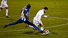 Alcoyano's Ali Diakite challenges Real Madrid's Eden Hazard during the upset