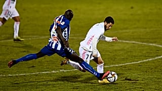 Alcoyano's Ali Diakite challenges Real Madrid's Eden Hazard during the upset
