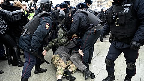 Riot police detain protesters during a rally in support of jailed opposition leader Alexei Navalny in downtown Moscow on January 23, 2021.