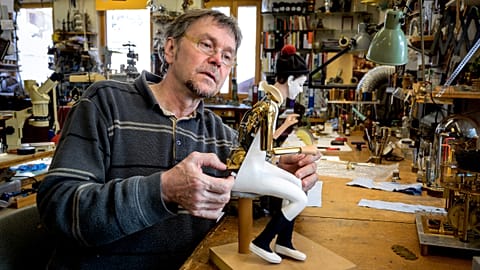 Swiss master Francois Junod working on a moving mechanical artwork.