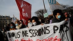 Students demonstrate with a banner reading "We will not be the the sacrificed generation", Jan. 20, 2021 in Paris.