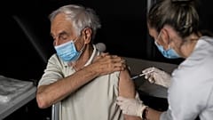 A nurse administers a dose of the Moderna COVID-19 vaccine at a vaccination center in Le Cannet, southern France, Jan. 21, 2021.