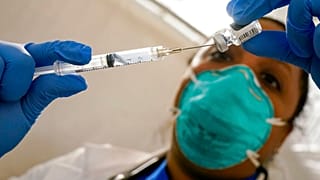 Virus Outbreak US Surge