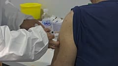 A Serbian patient receives a dose of the Chinese Sinopharm Covid-19 Vaccine