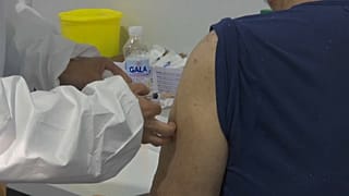 A Serbian patient receives a dose of the Chinese Sinopharm Covid-19 Vaccine