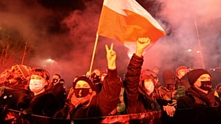 People protest against anti-abortion laws in Warsaw, Poland Wednesday Jan. 27, 2021