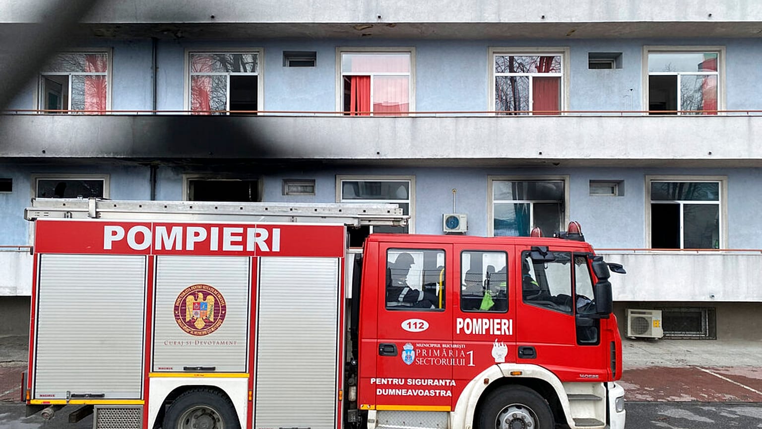 A fire engine is parked a hospital after a fire broke out on the ground floor Friday Jan. 29, 2021.