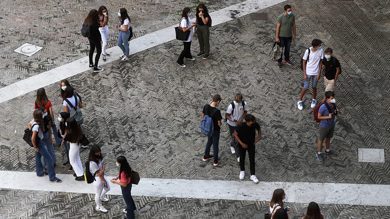 Students enter the Visconti high school, in Rome, Monday, Sept. 14, 2020.